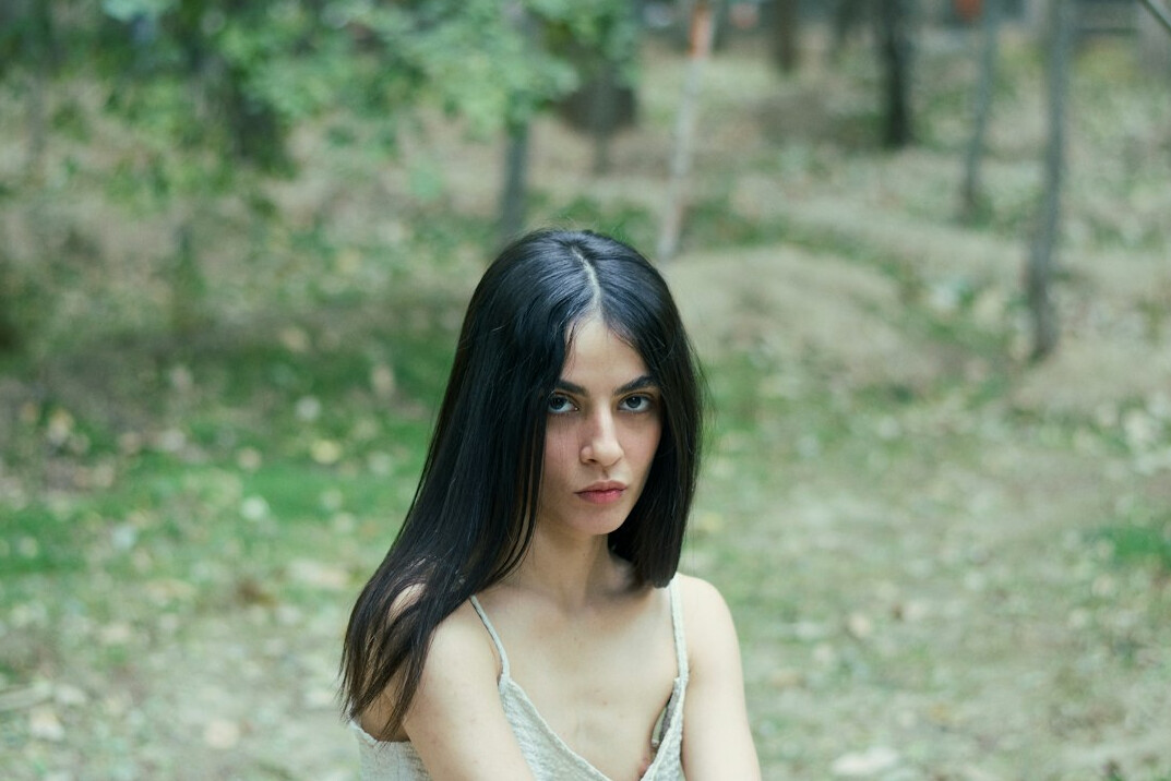 Portrait of a smiling woman with dark hair